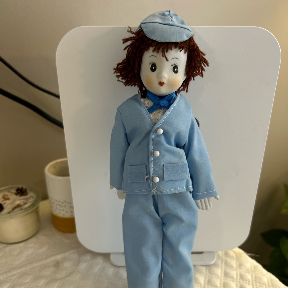Vtg Porcelain doll 9.5” tall